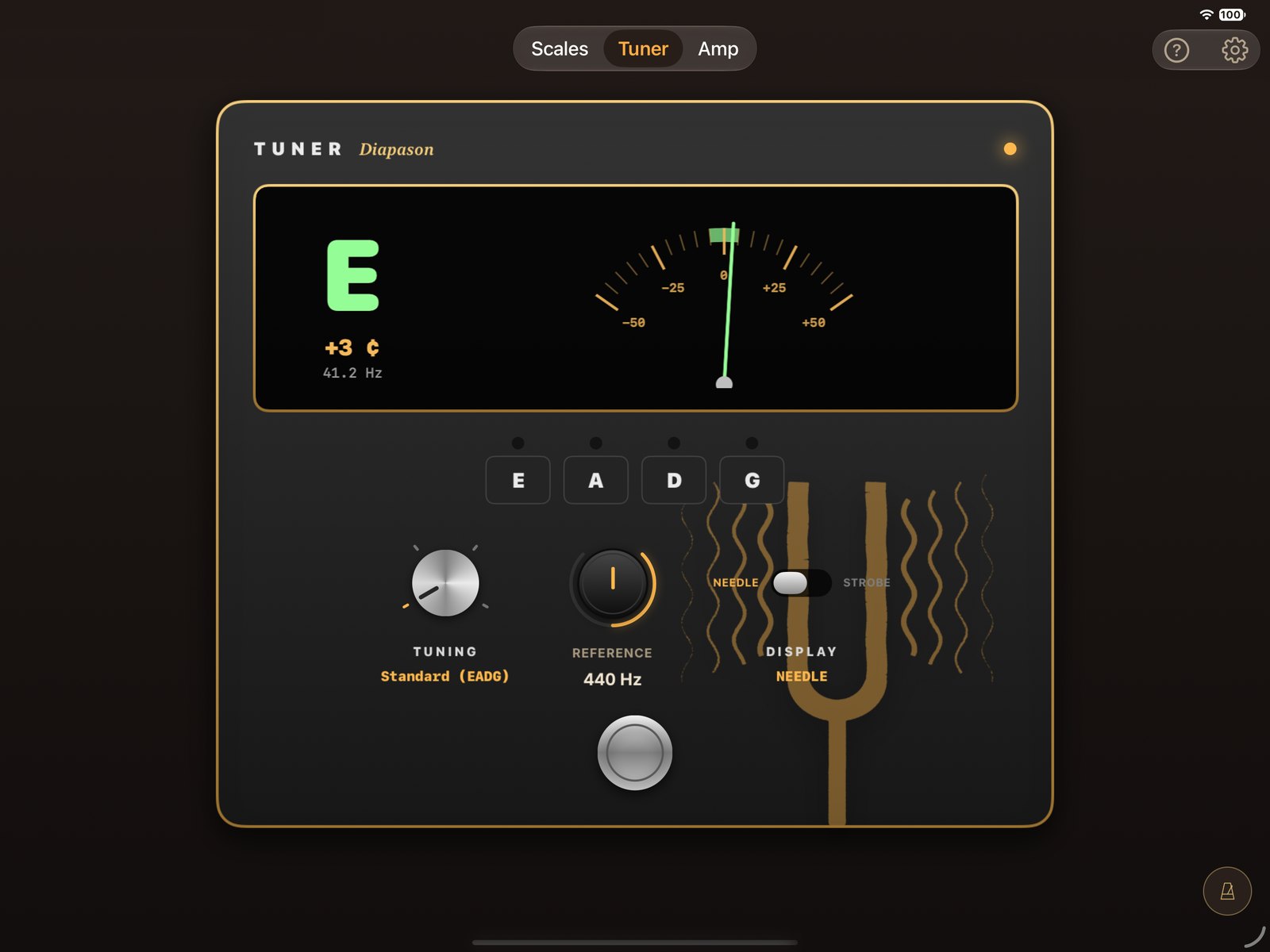 The pedal-style tuner, with its needle